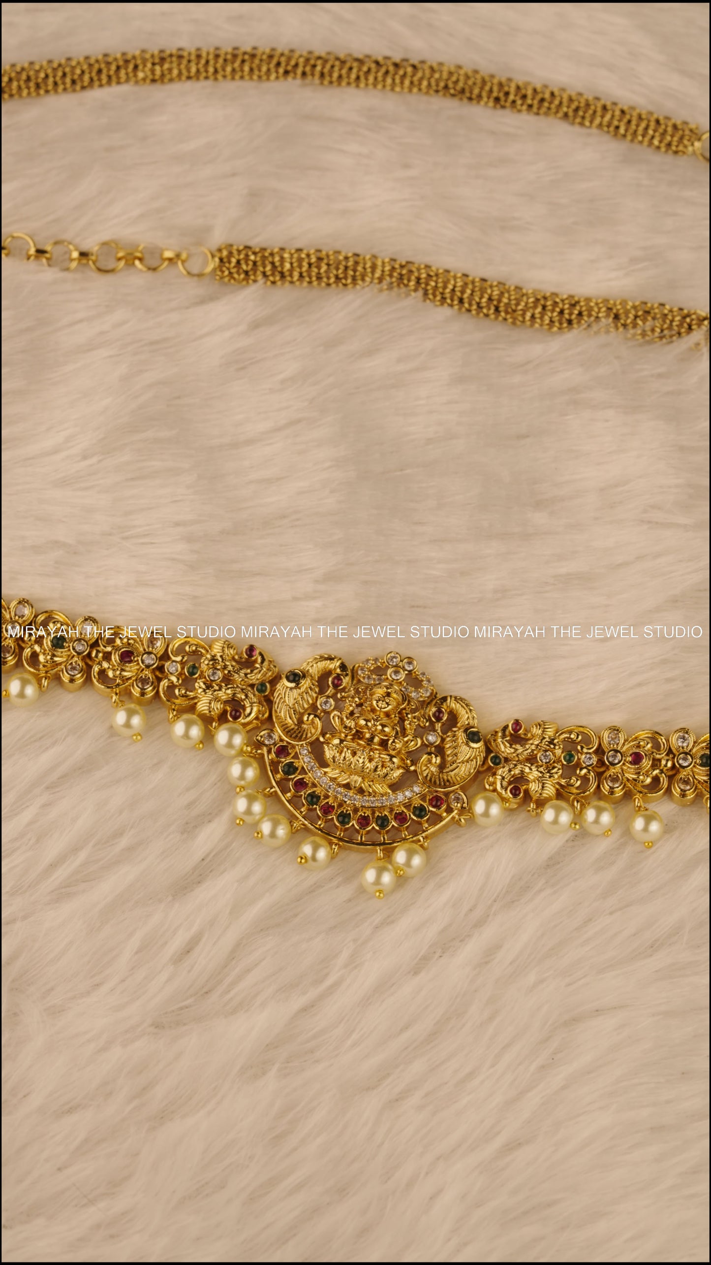 TWIN PEACOCK HIP CHAIN
