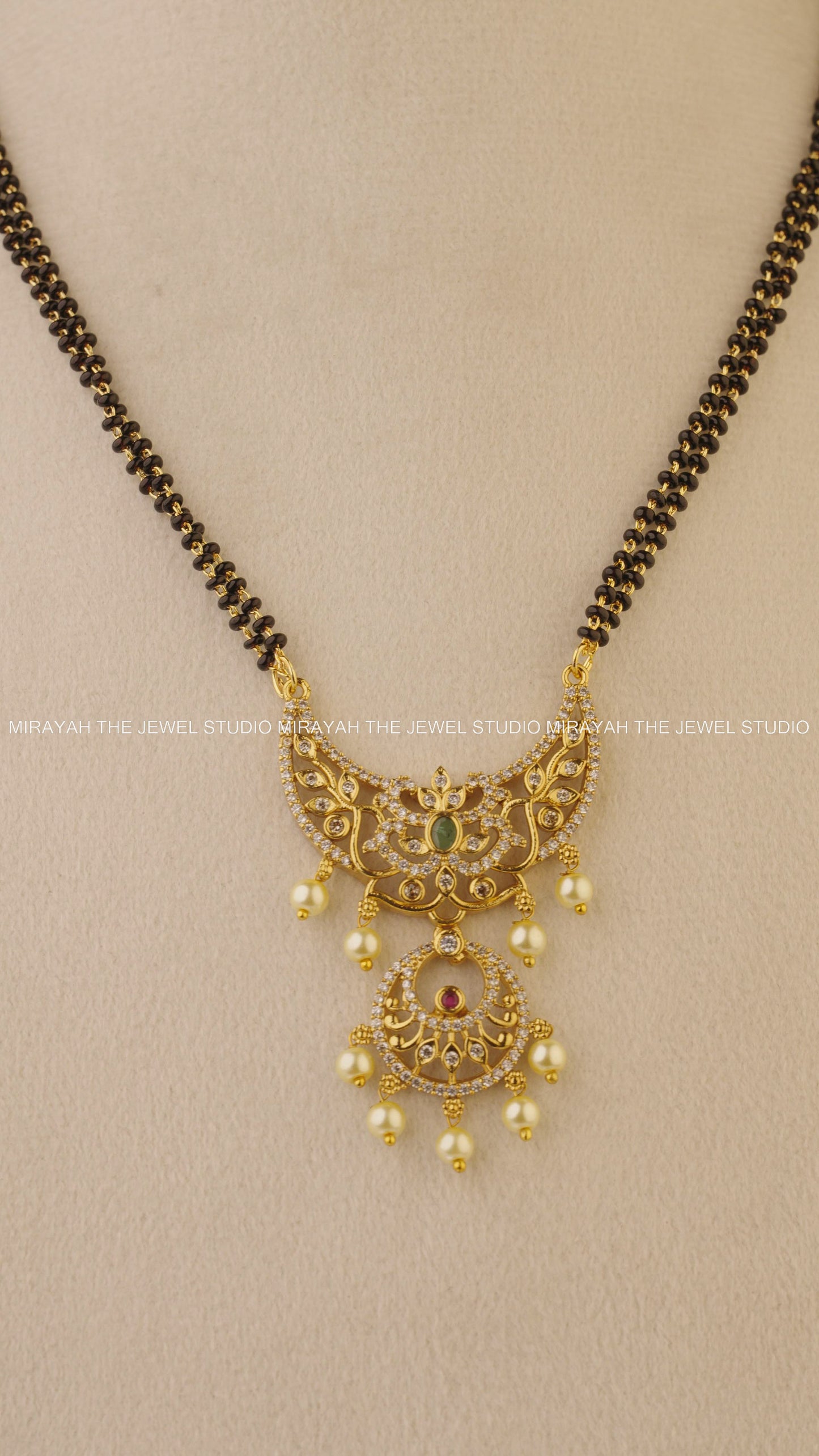 BLACK BEAD CRESCENT NECKLACE