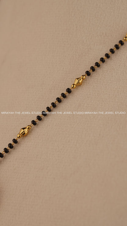 BLACK BEAD SUBHALAKSHMI NECKLACE - GREEN AND RUBY