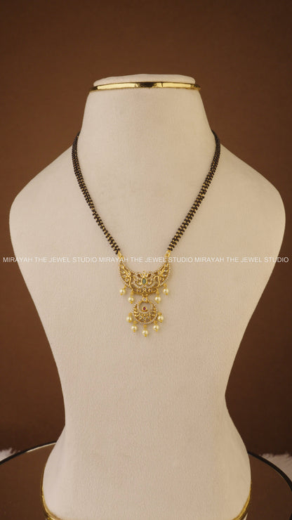 BLACK BEAD CRESCENT NECKLACE