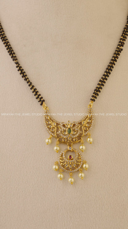 BLACK BEAD CRESCENT NECKLACE