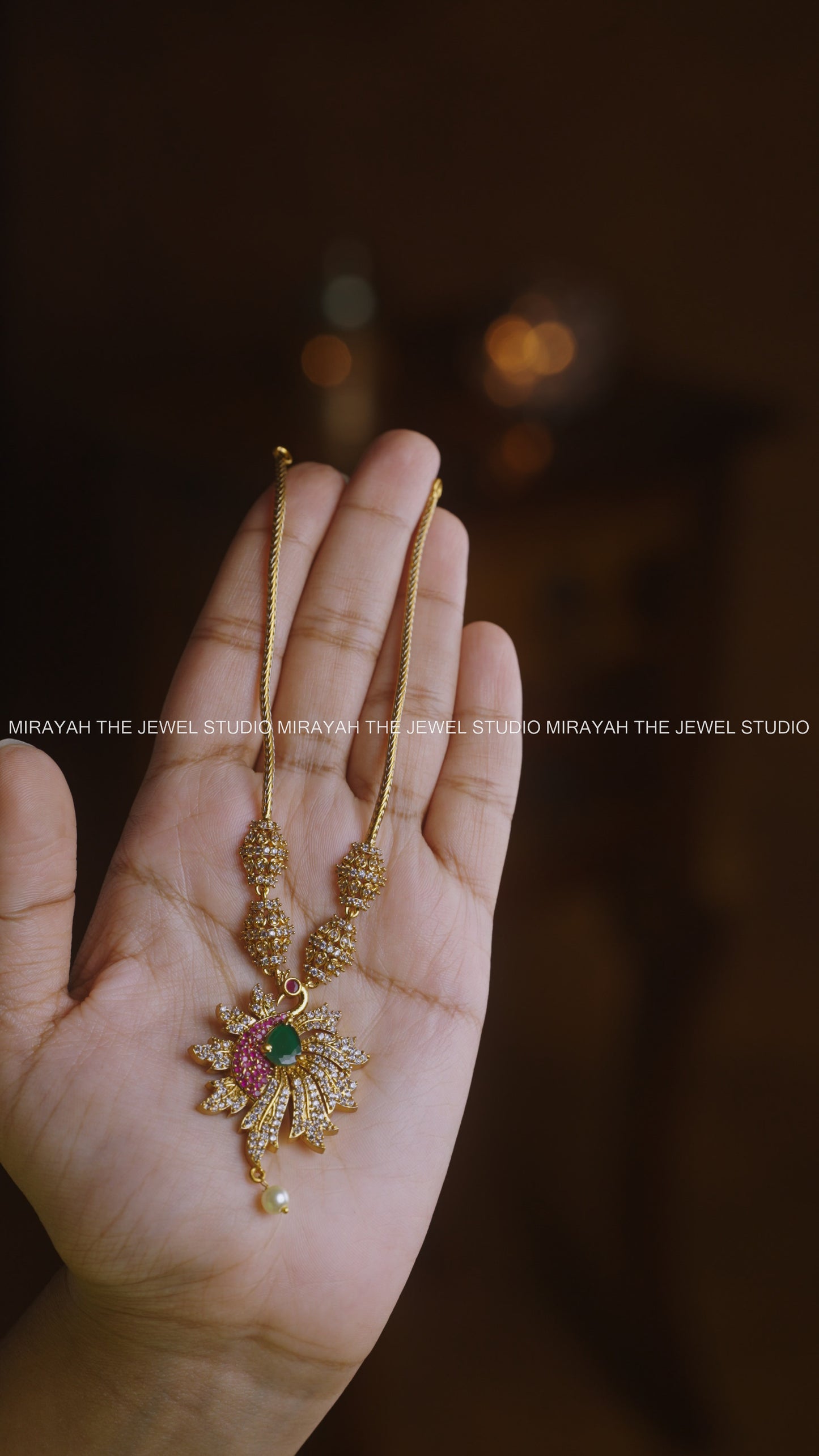 DANCING PEACOCK AD PENDANT NECKLACE