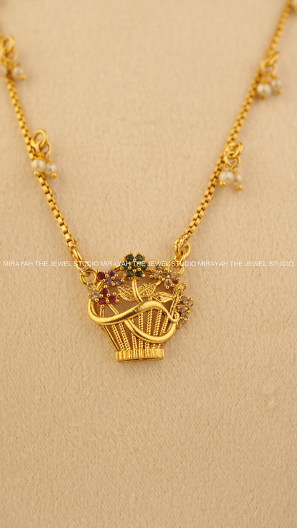 FLORAL BASKET NECKLACE