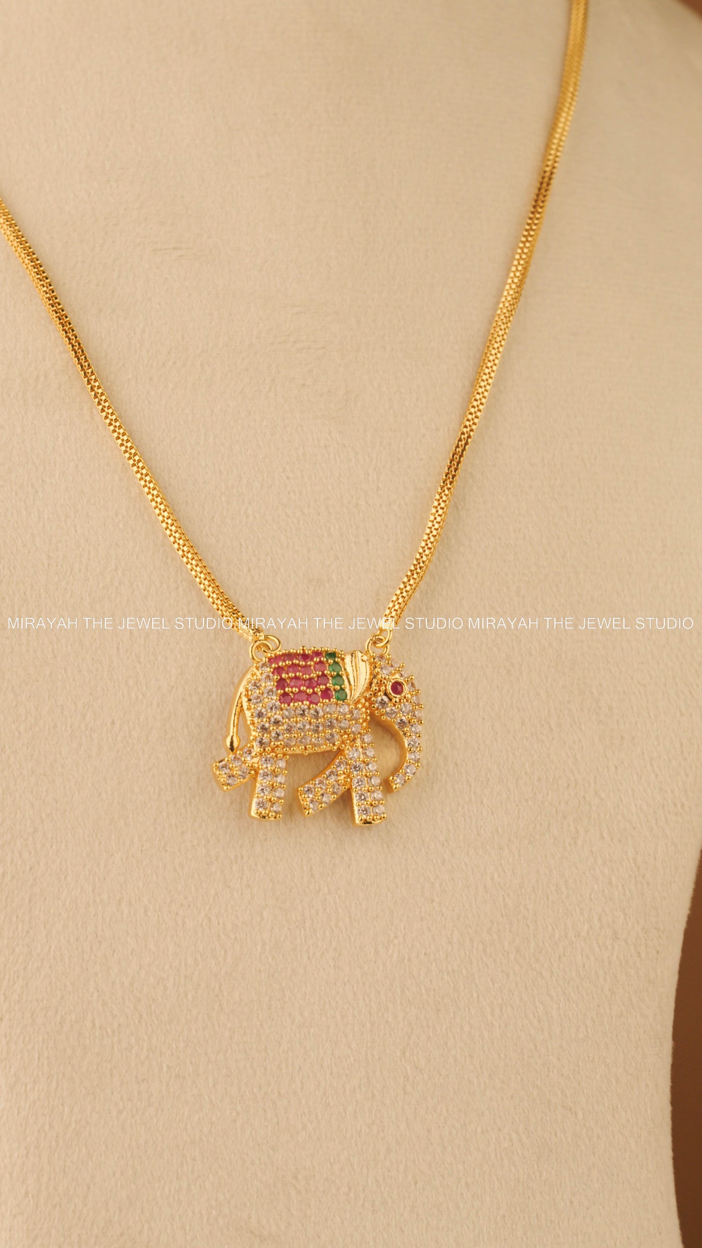 GOLD GAJA MUKHA CHARM - MULTI