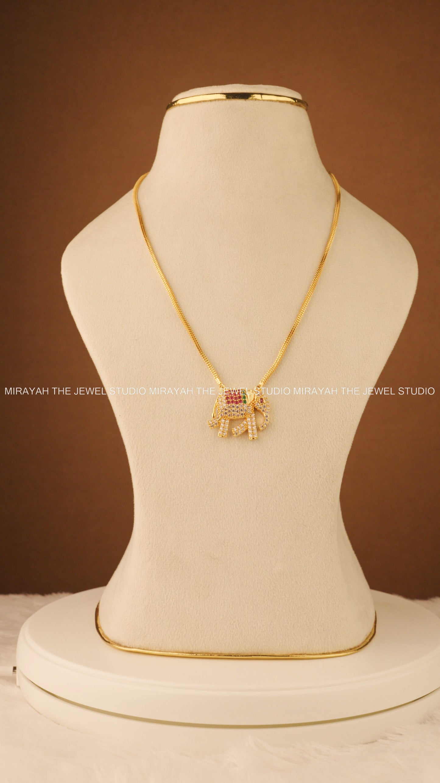 GOLD GAJA MUKHA CHARM - MULTI