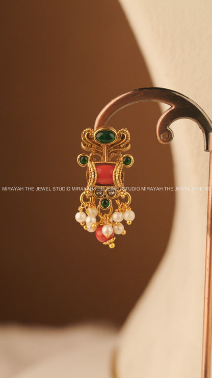 CORAL TUSKER NECKLACE