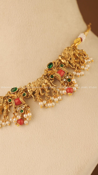 CORAL TUSKER NECKLACE