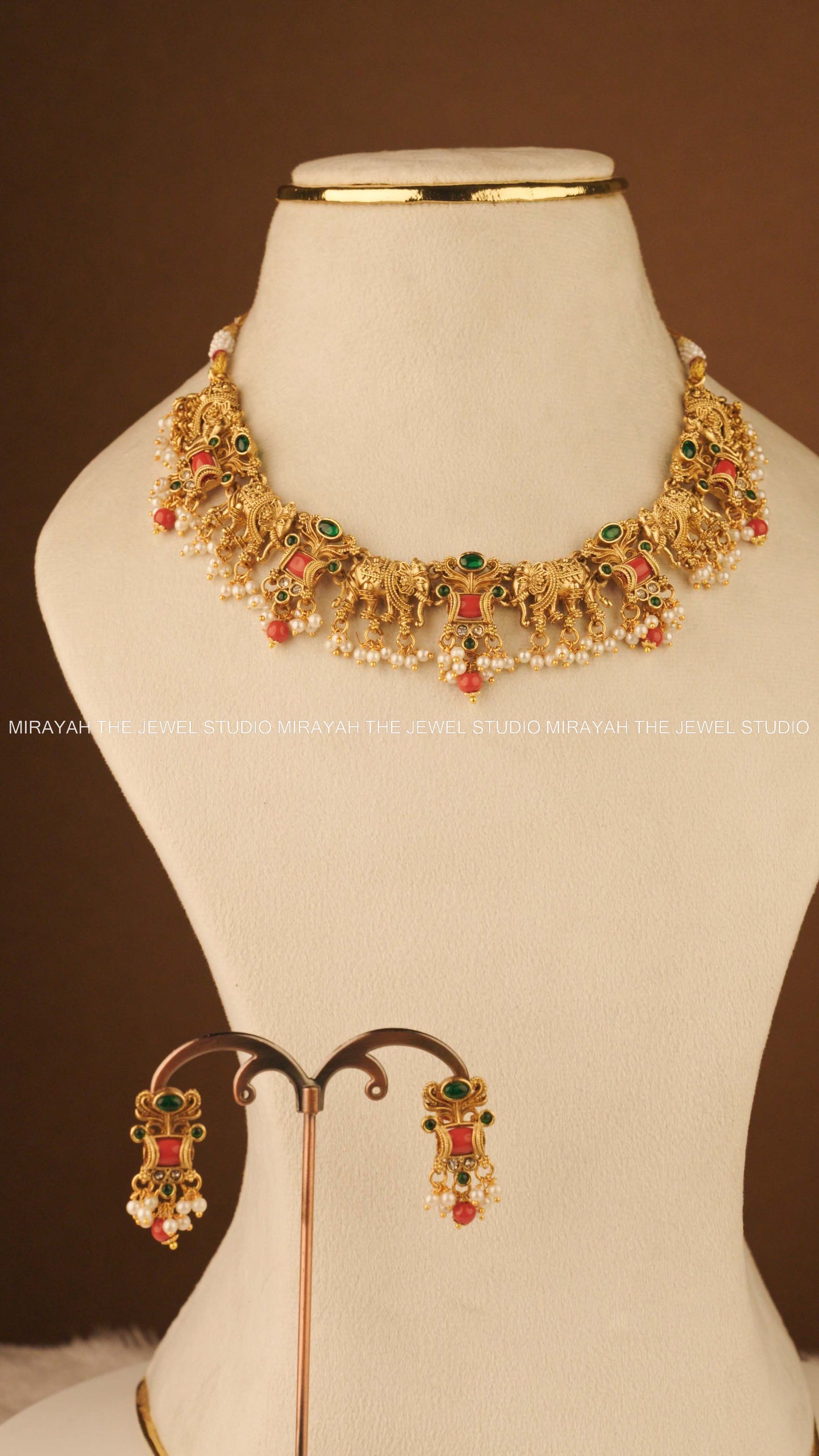 CORAL TUSKER NECKLACE