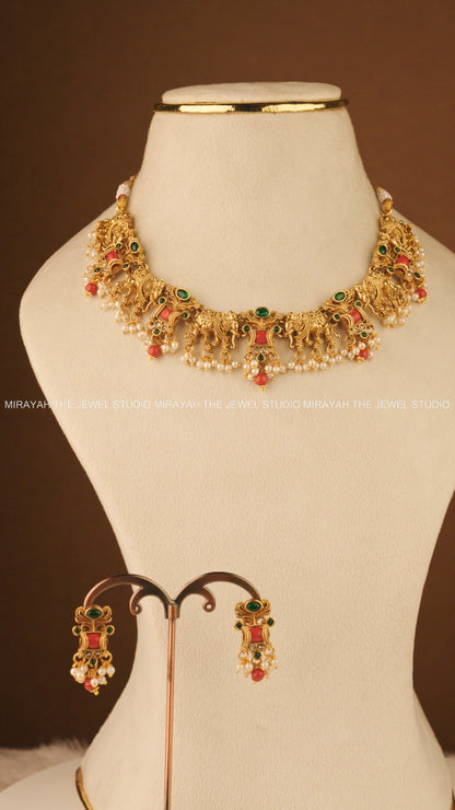 CORAL TUSKER NECKLACE