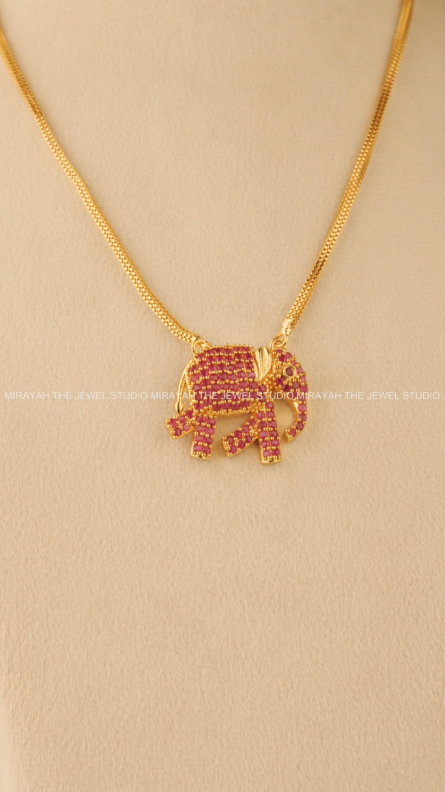 GOLD GAJA MUKHA CHARM - PINK